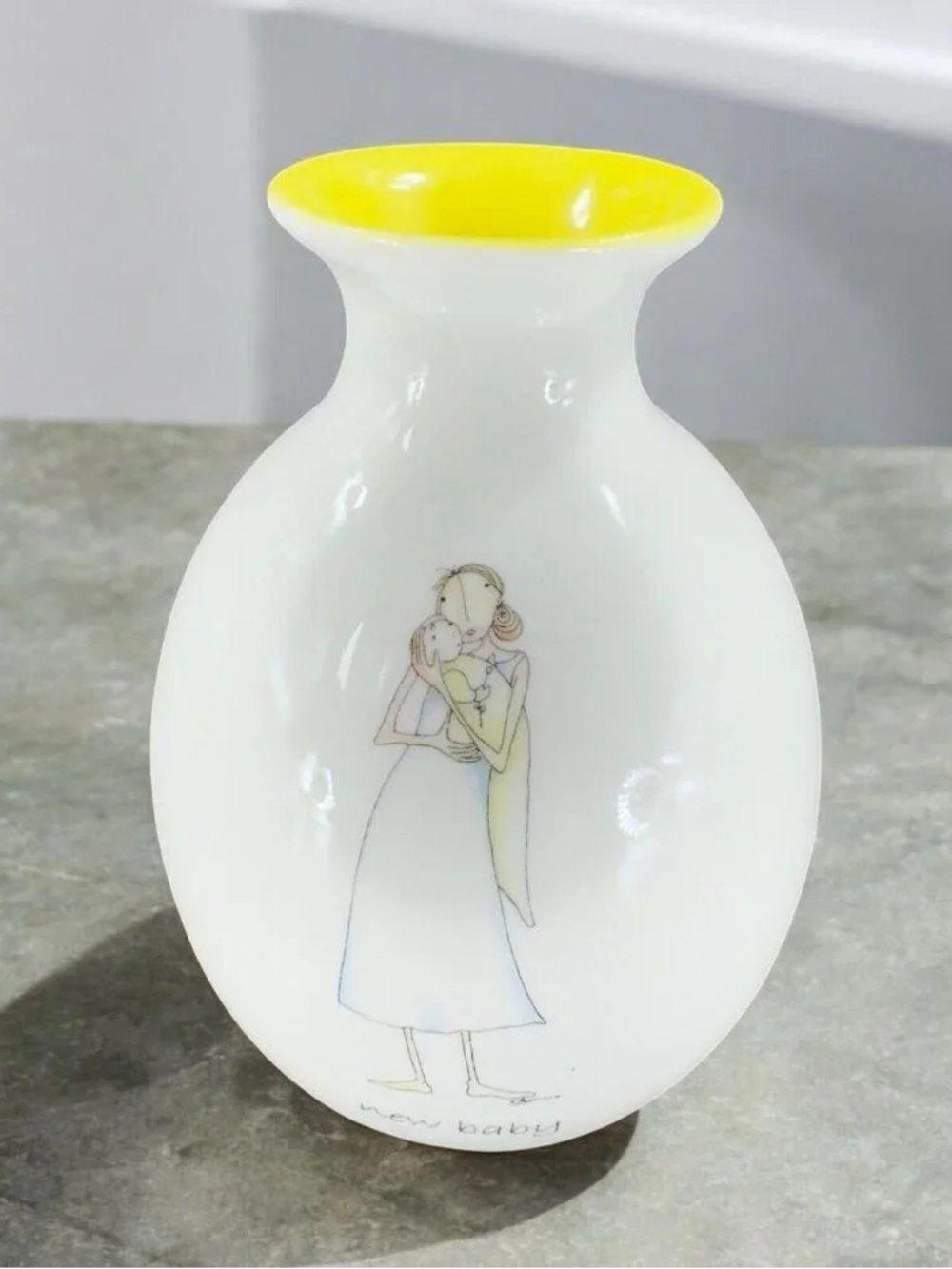 White Ceramic Bud Vase with Yellow Rim and New Baby Illustration
